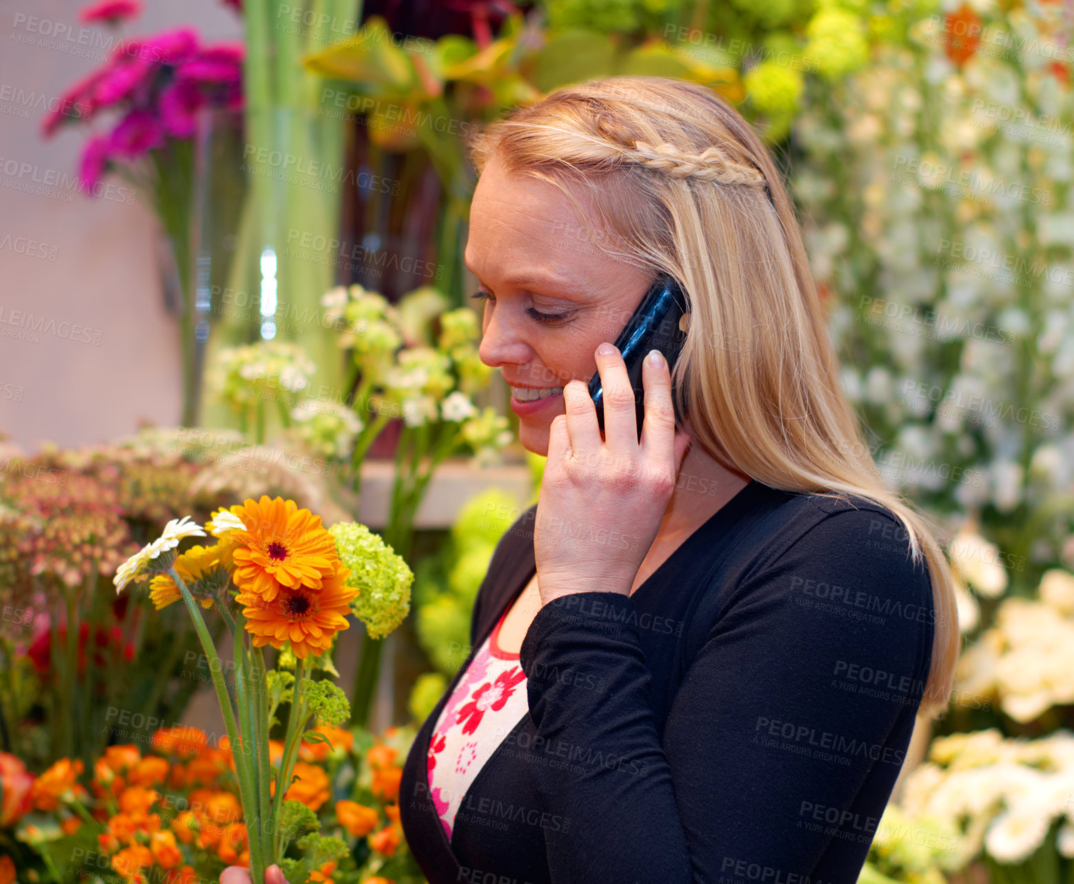 Buy stock photo Woman florist in shop with flowers, phone call and communication with small business contact. Female owner, customer and talking to flower supplier on mobile, botany industry or nursery on technology