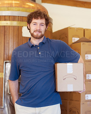 Buy stock photo Portrait, beer and box with a man in a brewery for the production, packaging and delivery of alcohol. Warehouse, logistics and industry with a male brewer in a factory for stock taking or shipping