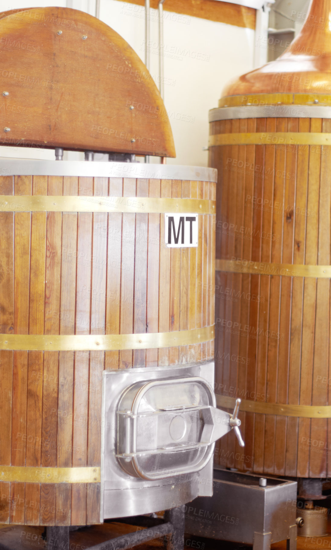 Buy stock photo Brewery, machine and barrel for beer, alcohol and brewing process with a tap. Wooden, drum and alcoholic beverage at a distillery for storage, fermentation and manufacturing, industry or system