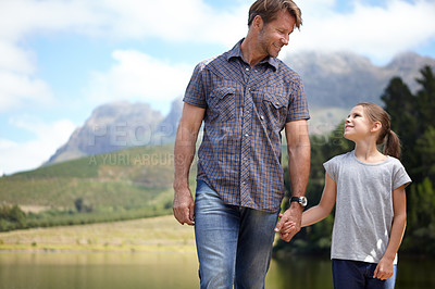 Buy stock photo Father, daughter and holding hands by a lake, bonding in nature or camping with holiday, travel and family time. Love, support and trust, man and young girl outdoor for adventure and fresh air