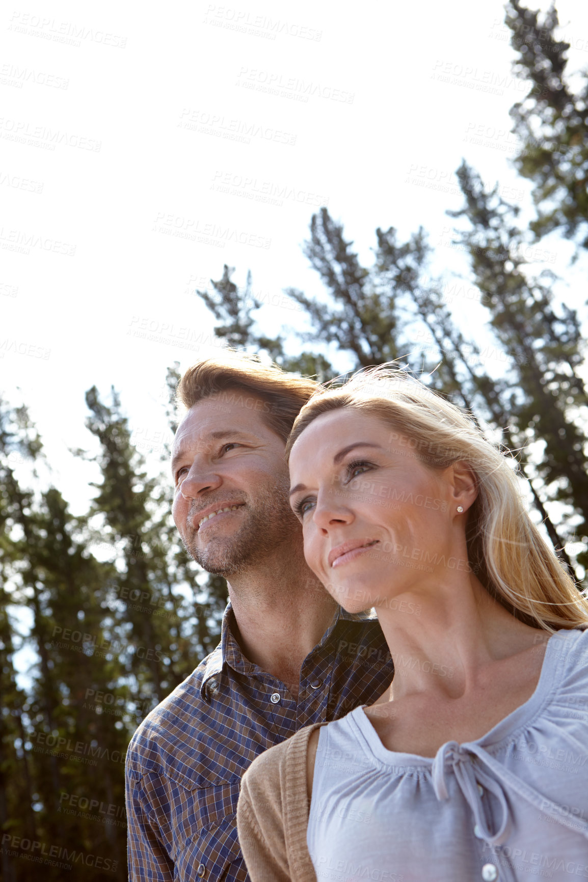 Buy stock photo Couple, nature and view outdoor with travel for vacation, man and woman with fresh air for bonding in environment. Love, support and trust with low angle, happy and calm with peace in forest together