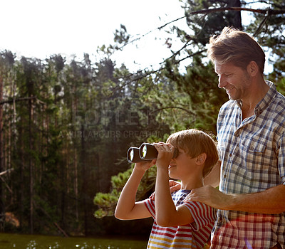 Buy stock photo Nature, man and son with binoculars in forest for sightseeing, summer vacation and exploring environment. Smile, kid and dad with field glasses for vision, happiness and tourism together in Europe