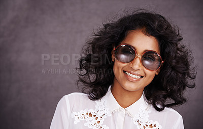Buy stock photo Studio, smile and fashion for portrait of woman with sunglasses and confidence for Indian girl. Dark background, adult and female person with unique style, relax and aesthetic for proud model