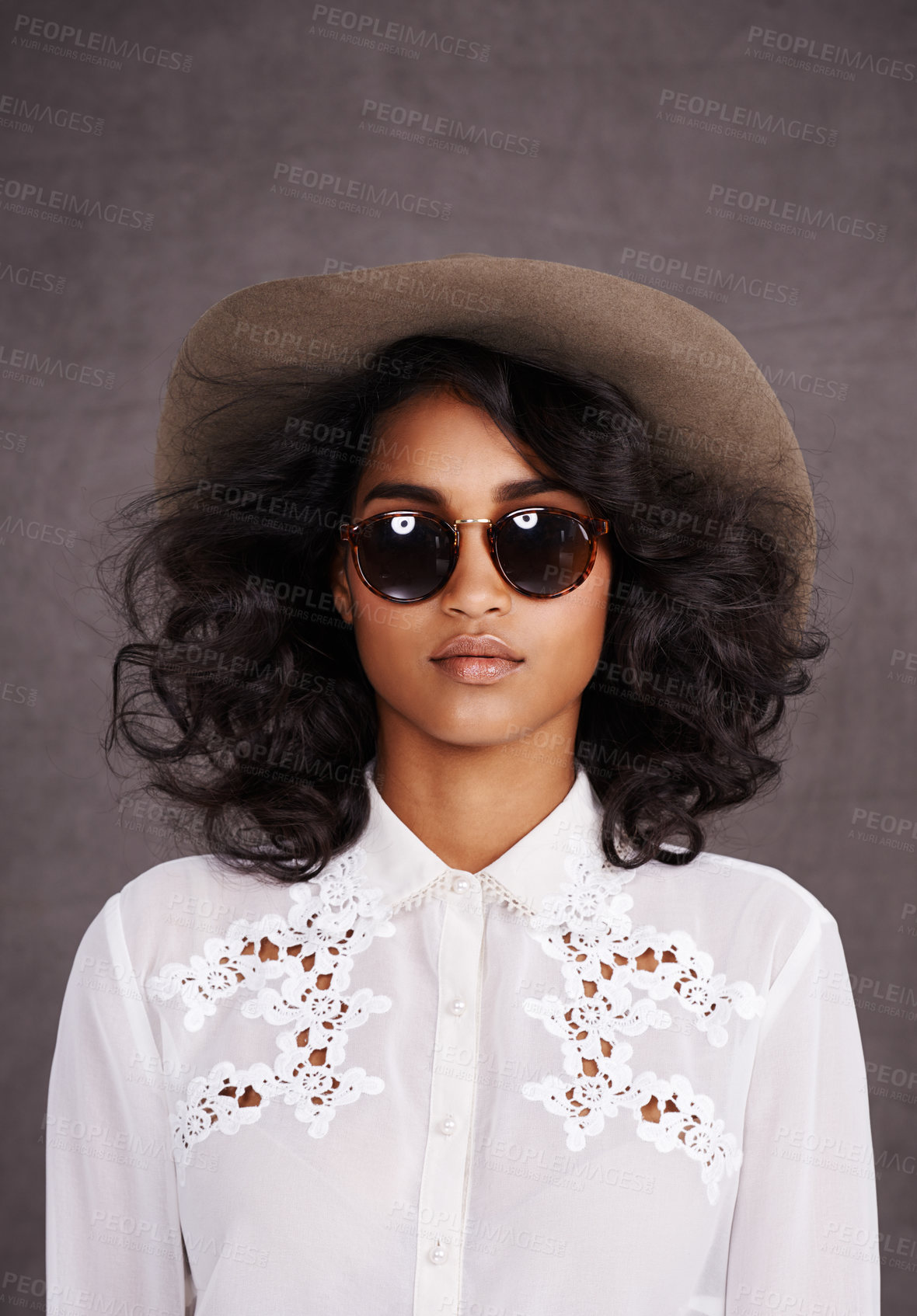 Buy stock photo Portrait, sunglasses and woman with cowboy fashion, confidence  and relax with girl in stetson hat. Rodeo, western style and Mexican model with cowgirl culture, wild west clothes and grey background