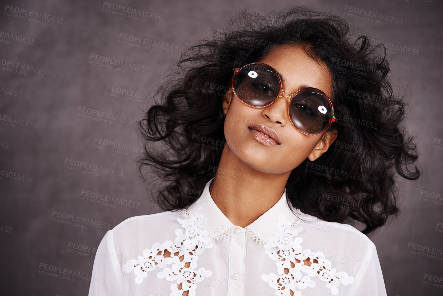 Buy stock photo Studio, boho and fashion for portrait of woman with sunglasses and confidence for Indian girl. Dark background, adult and female person with unique style, relax and aesthetic for proud model