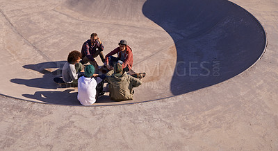 Buy stock photo Group, skate park and friends with conversation, relax and sunshine with weekend break and team. People, outdoor and skaters with summer and recreation with diversity and support with discussion