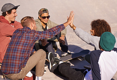 Buy stock photo Skate park, high five and relax with friends, support and bonding together with happiness and conversation. Outdoor, hobby and hand gesture with recreation and team with success, smile or celebration