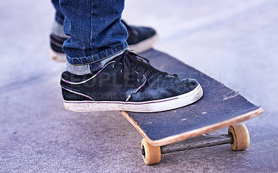 Buy stock photo Cropped shot of a person on a skateboard