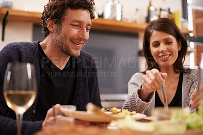 Buy stock photo Couple, food and table for bonding in home, conversation and healthy meal in apartment for anniversary. Happy people, marriage and eating together on weekend, relax and speak on romantic dinner date