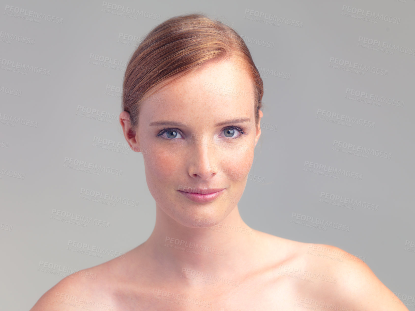 Buy stock photo Portrait, beauty and skincare of woman in makeup for glow, shine or health in studio isolated on a white background. Face, ginger model and young person with cosmetics or treatment for dermatology