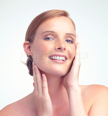 Buy stock photo Portrait, beauty and skincare of happy woman in makeup for glow, shine or health in studio isolated on a white background. Face, smile and model touch skin with cosmetics or treatment for dermatology