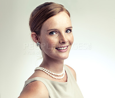 Buy stock photo Portrait, beauty and happy woman in pearl necklace in studio isolated on a gray background mockup. Face, freckles and skin of young person in vintage clothes for fashion, elegance or style in Ireland