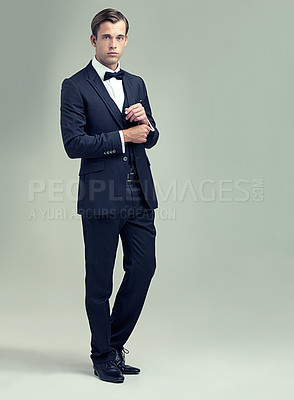 Buy stock photo A full length studio shot of a handsome young man in a stylish vintage suit