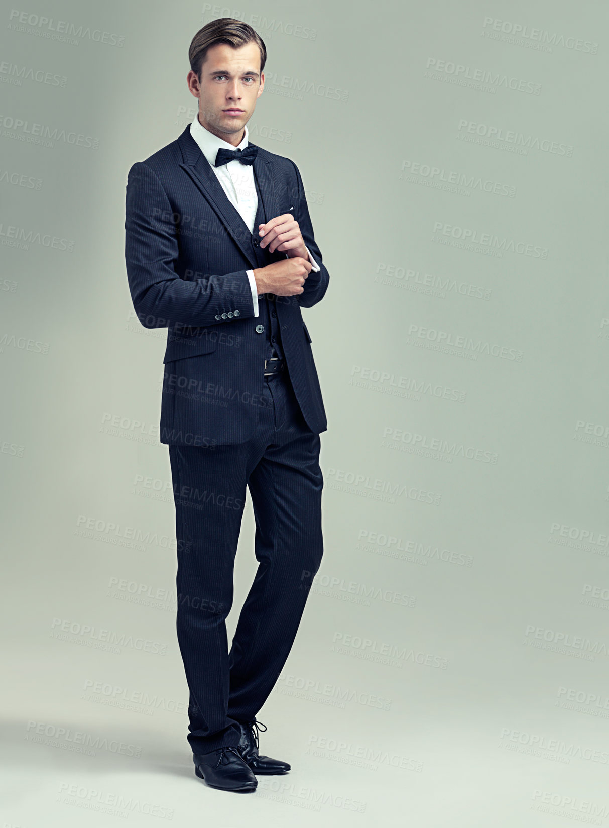 Buy stock photo A full length studio shot of a handsome young man in a stylish vintage suit