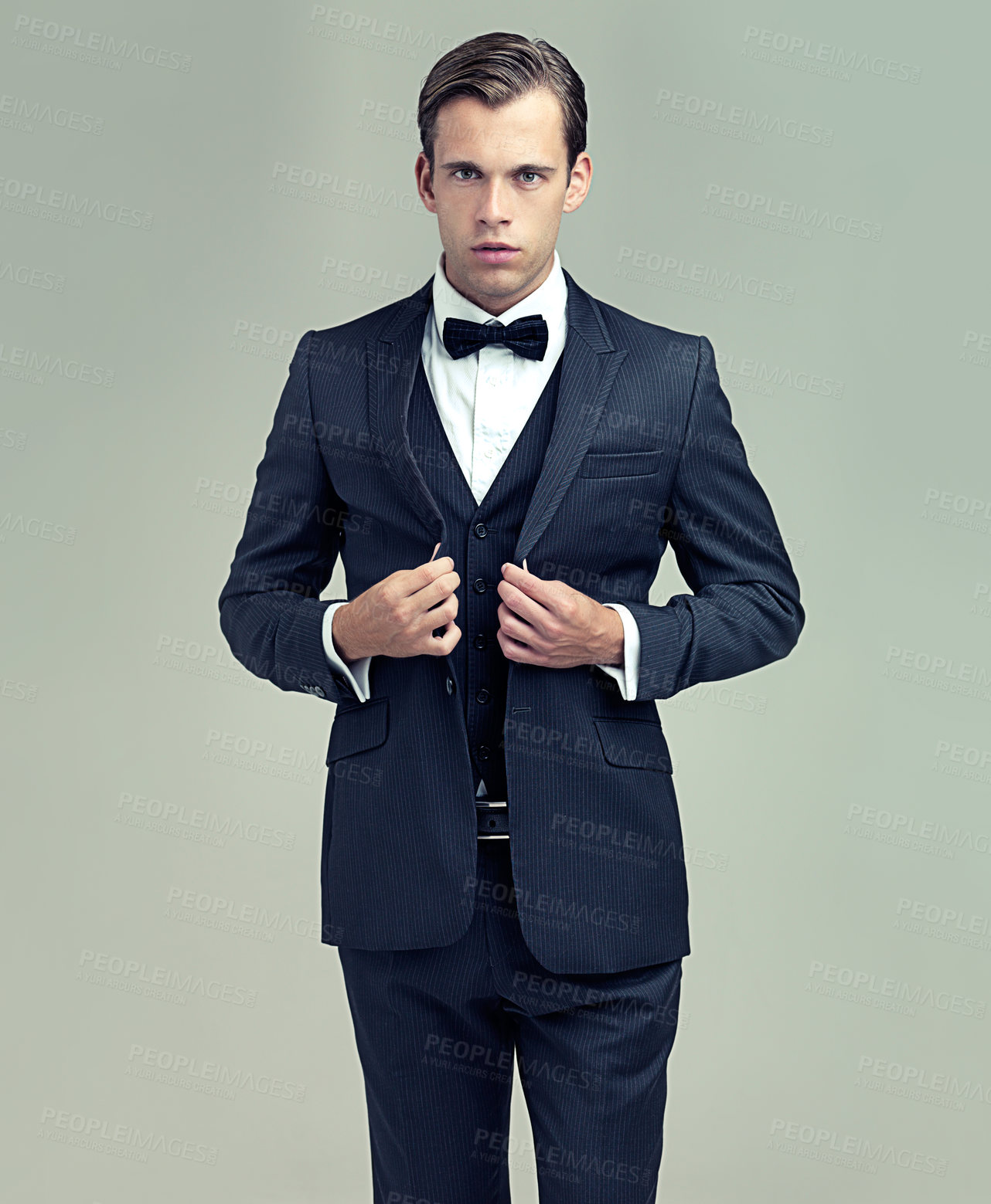 Buy stock photo Man, studio and portrait with vintage, suit and fashion for class or luxury retro wealth. Gentleman, tuxedo and spy or agent with confidence, style and serious attitude isolated on white background