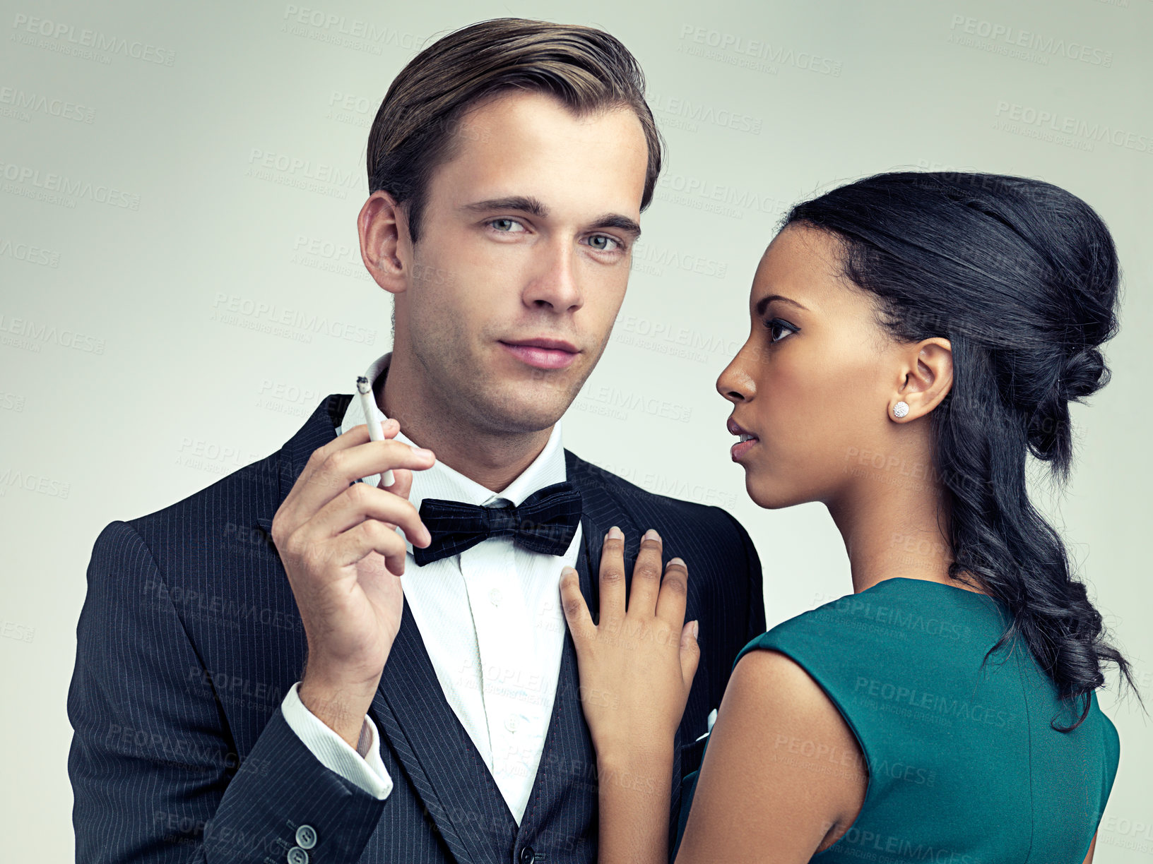 Buy stock photo Cigarette, fashion and portrait of couple with elegant, formal and stylish clothes for event in studio. Luxury, party and man and woman smoking with confidence, pride and glamour on white background