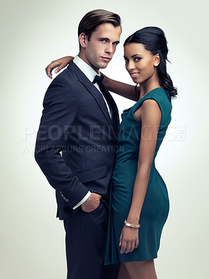 Buy stock photo Couple, studio and portrait with retro, vintage and fashion for rich luxury romance. Man, woman and model with tuxedo, glamour and confidence for classy black tie event isolated on white background