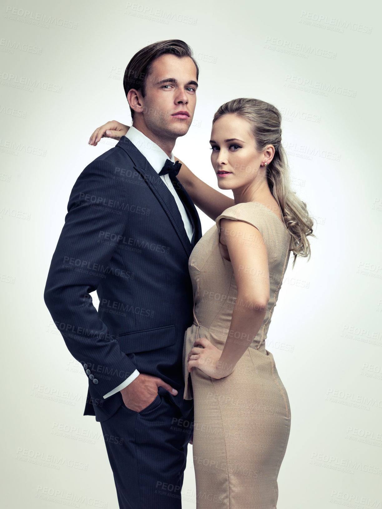 Buy stock photo A studio portrait of a couple in stylish vintage evening wear