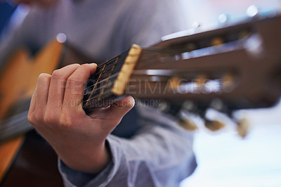 Buy stock photo Learning, music and hand of child with guitar for lesson and development of skill with instrument. Playing, practice and kid with creative education as musician with acoustic sound on strings
