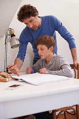 Buy stock photo Teen, dad and help with studying in home, student and support for assignment or project. Daddy, boy and schoolwork on weekend in bedroom, education and assistance or guidance for learning by desk