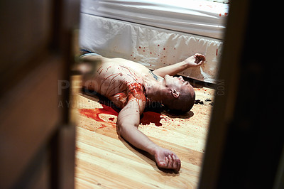Buy stock photo Cropped shot of a male corpse lying on the bedroom floor