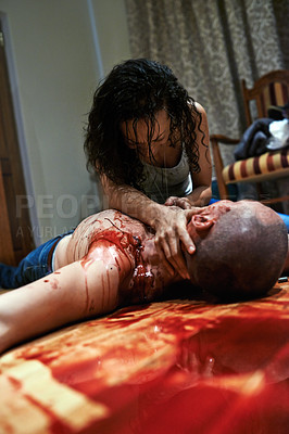 Buy stock photo Cropped shot of a distraught young woman finding her partner bloodied and dead on the floor