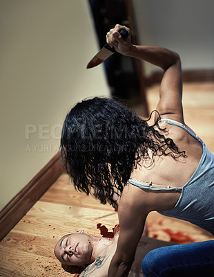 Buy stock photo Cropped shot of a woman stabbing a man to death