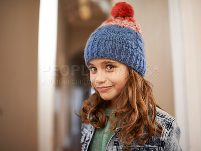 Buy stock photo Girl, portrait and child with fashion in winter at home with pride and happiness in clothes with hat. Kid, smile or relax in house with beanie, jacket or casual style on holiday or vacation in Sweden