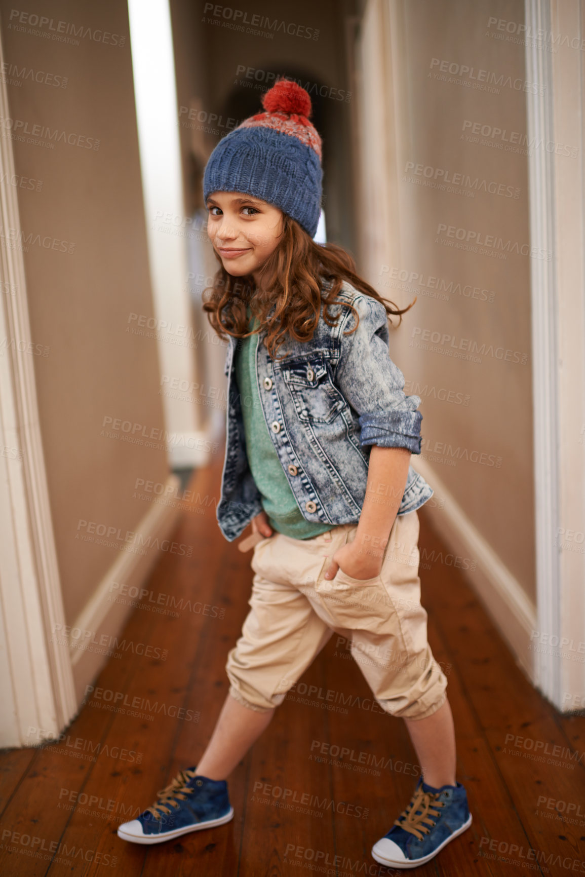 Buy stock photo Girl, portrait and child with fashion in home with pride and happiness in clothes for winter. Kid, smile or relax in house with beanie, jacket or casual style on holiday or vacation in Finland