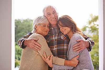 Buy stock photo Outdoor, portrait and old man hug family on patio of home, smile and happiness from wife and daughter. House, adult and male person embrace women with love for visit of girl, parents and retirement