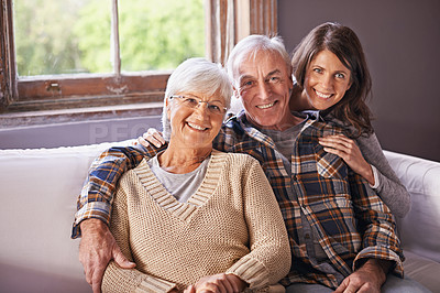 Buy stock photo Woman, senior parents and portrait on sofa with hug, smile and connection with care, love and bonding. Old couple, mother and daughter with father on couch in living room with  embrace in family home