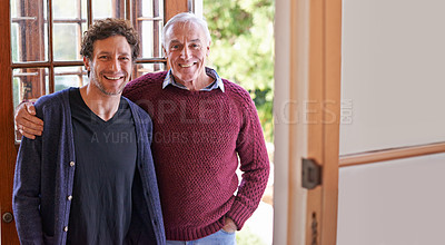 Buy stock photo A cropped portrait of a happy father and his adult son standing at home