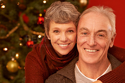 Buy stock photo Senior, couple and hug on Christmas in portrait, happiness with gratitude and love to celebrate holiday. Trust, support and care with people at xmas party in the home, face and bonding with joy