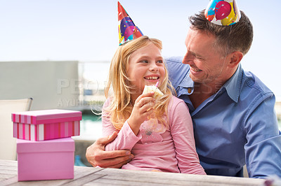 Buy stock photo Girl, dad or happy birthday at family, party or cake to love, bonding or together at poolside patio. Papa, child or smile at cupcake, candle or gift to embrace, care or celebrate as childhood wish