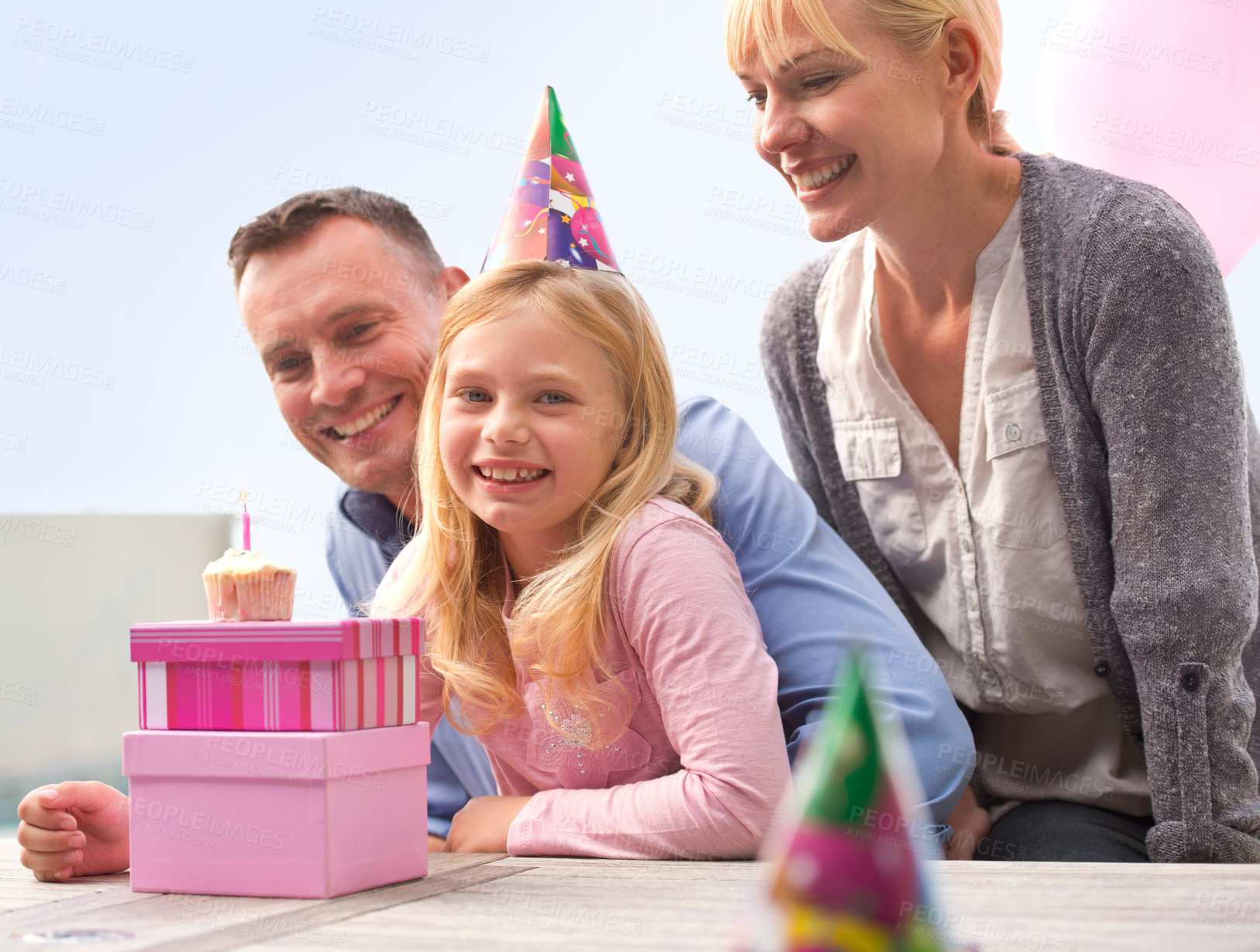Buy stock photo Portrait, family or cake at happy birthday, party or candle as love, bonding or together outside. Papa, mama or girl as smile at box, gift or celebration of congratulations, childhood or growth