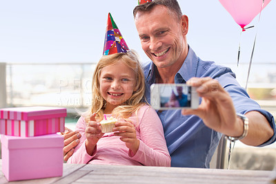 Buy stock photo Father, child and birthday with selfie, cell phone and picture for memories or social media. Daughter, cake and presents for celebration outside, photo and screen on technology for photograph 