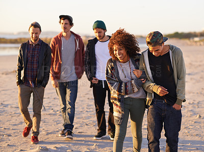 Buy stock photo Summer, sunset and couple with friends at beach for support, adventure and vacation together in California. Nature, sand and people by ocean for holiday, travel or weekend trip with love at seaside