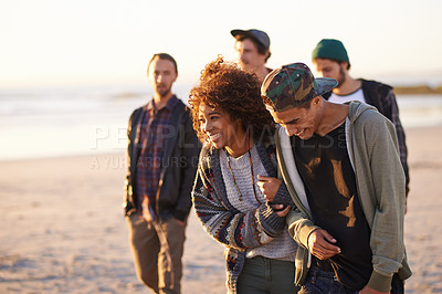 Buy stock photo Travel, beach and laughing friends walking in nature for vacation, bonding or holiday together at sunset. Happy, journey or gen z group of people at sea for fresh air, conversation or ocean adventure