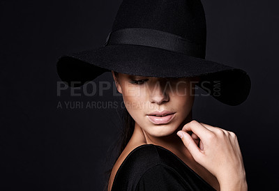 Buy stock photo Portrait of an attractive woman wearing a black hat