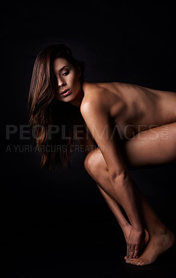 Buy stock photo A young woman with gorgeous skin posing sensually