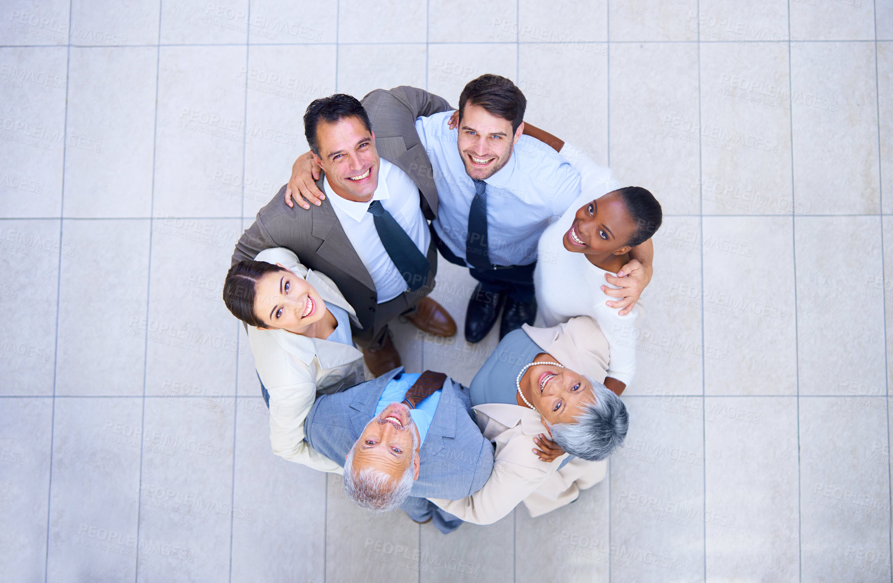 Buy stock photo Huddle, portrait and business people in circle for support, solidarity and office partnership. Employee, diversity and corporate team with collaboration for meeting, motivation and happy from above