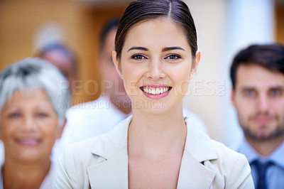 Buy stock photo Leadership, portrait and business woman with group in office for collaboration, teamwork or support. Face, smile or female lawyer with paralegal team at law firm for startup, about us or career