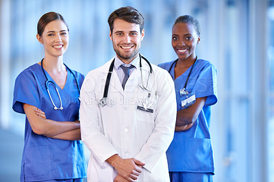 Buy stock photo Medical, collaboration and portrait of doctor with nurses standing in a corridor of the hospital. Confidence, diversity and team of happy professional healthcare workers with smile in medicare clinic