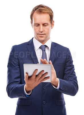 Buy stock photo Businessman, tablet and typing on social media, networking or online marketing against a white studio background. Isolated CEO man holding touchscreen for market advertising, internet or trading