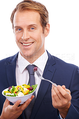 Buy stock photo Business man, smile portrait and eating salad for healthy nutrition, green food diet and employee health motivation. Corporate man, vegan lunch meal and happiness, isolated in white background studio