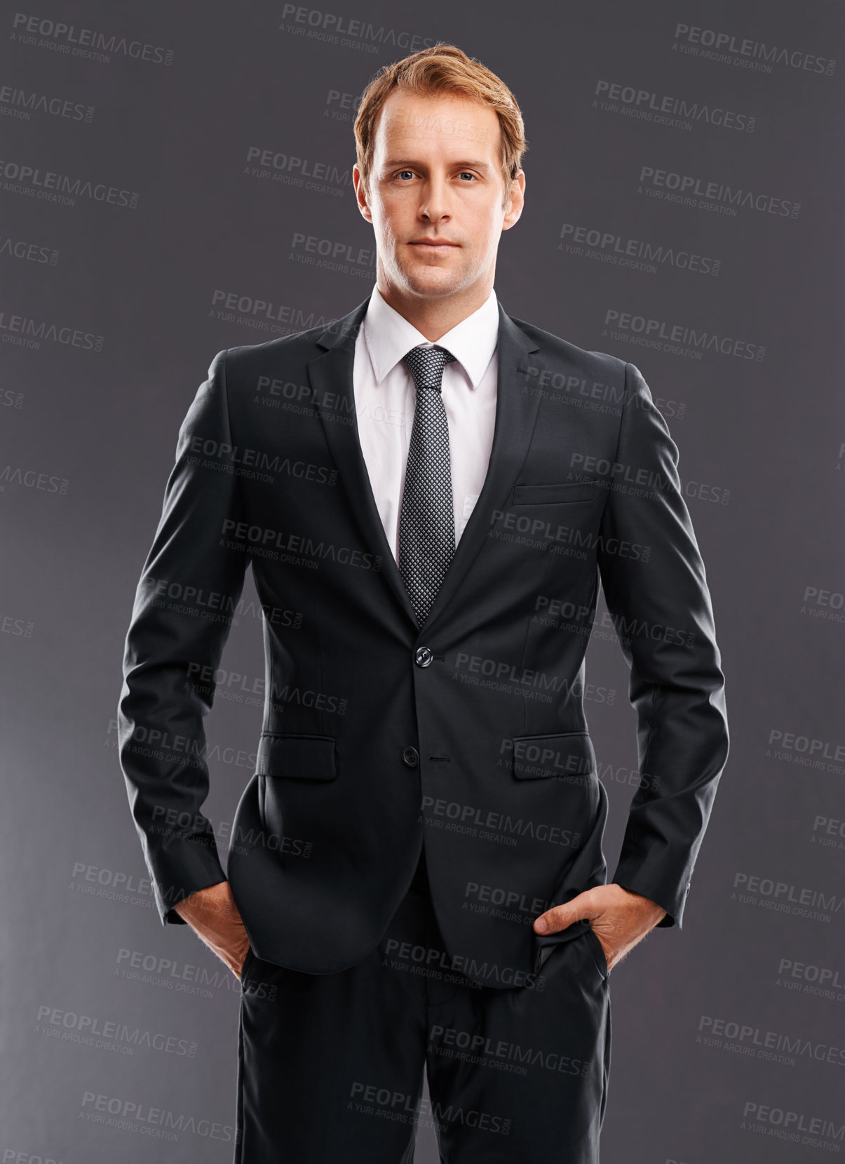 Buy stock photo Businessman, boss and suit in formal wear standing against a grey studio background. Portrait of isolated CEO entrepreneur man model posing in confidence for classy profile as a career executive