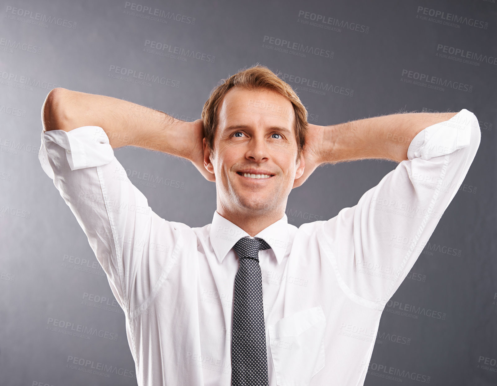 Buy stock photo Business man, happy and thinking to relax with a smile and idea for future, vision and career in studio. Face of a male entrepreneur with hands behind head to think about decision, ideas or choice