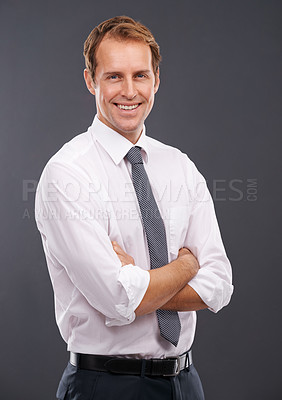 Buy stock photo Corporate, leader and management portrait of man with optimistic career mindset and happy smile. Professional businessman smiling with happiness and arms crossed at isolated gray background.