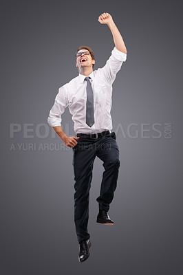 Buy stock photo Business, man and jump for celebration, excited and achievement with company, deal and isolated on studio background. Male entrepreneur, employee or consultant happy, promotion or jumping for target 