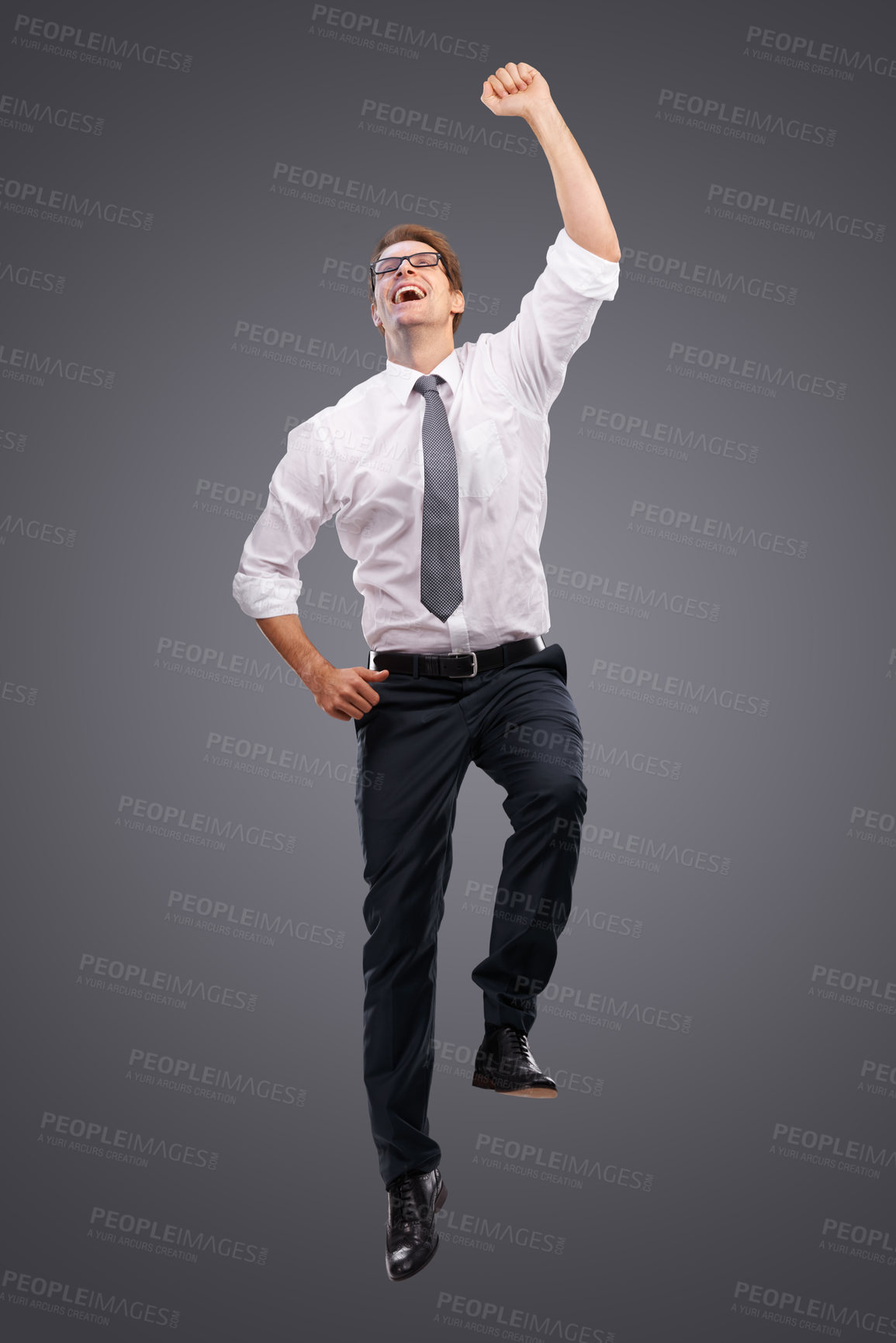 Buy stock photo Business, man and jump for celebration, excited and achievement with company, deal and isolated on studio background. Male entrepreneur, employee or consultant happy, promotion or jumping for target 